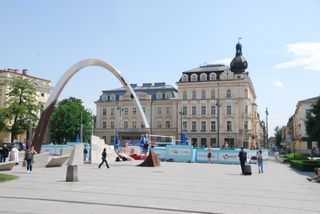 Square near the main train station with a beach volleyball court