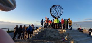 Everyone want to take a picture by the iron globe