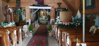 The interior of a festively decorated church