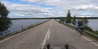 A couple traveling on bycicles