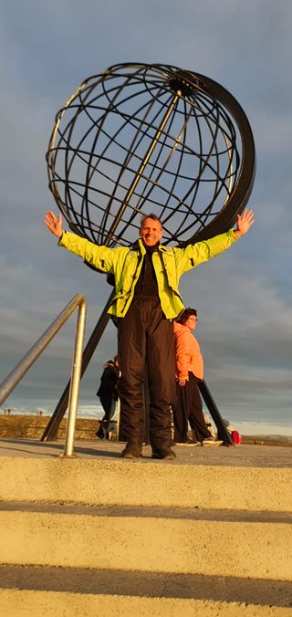Posing in front of the iron globe