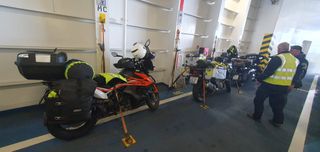 Securing the motorcycles on the ferry