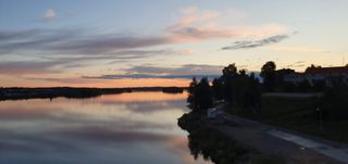 A picture of a calm lake at 11 p.m
